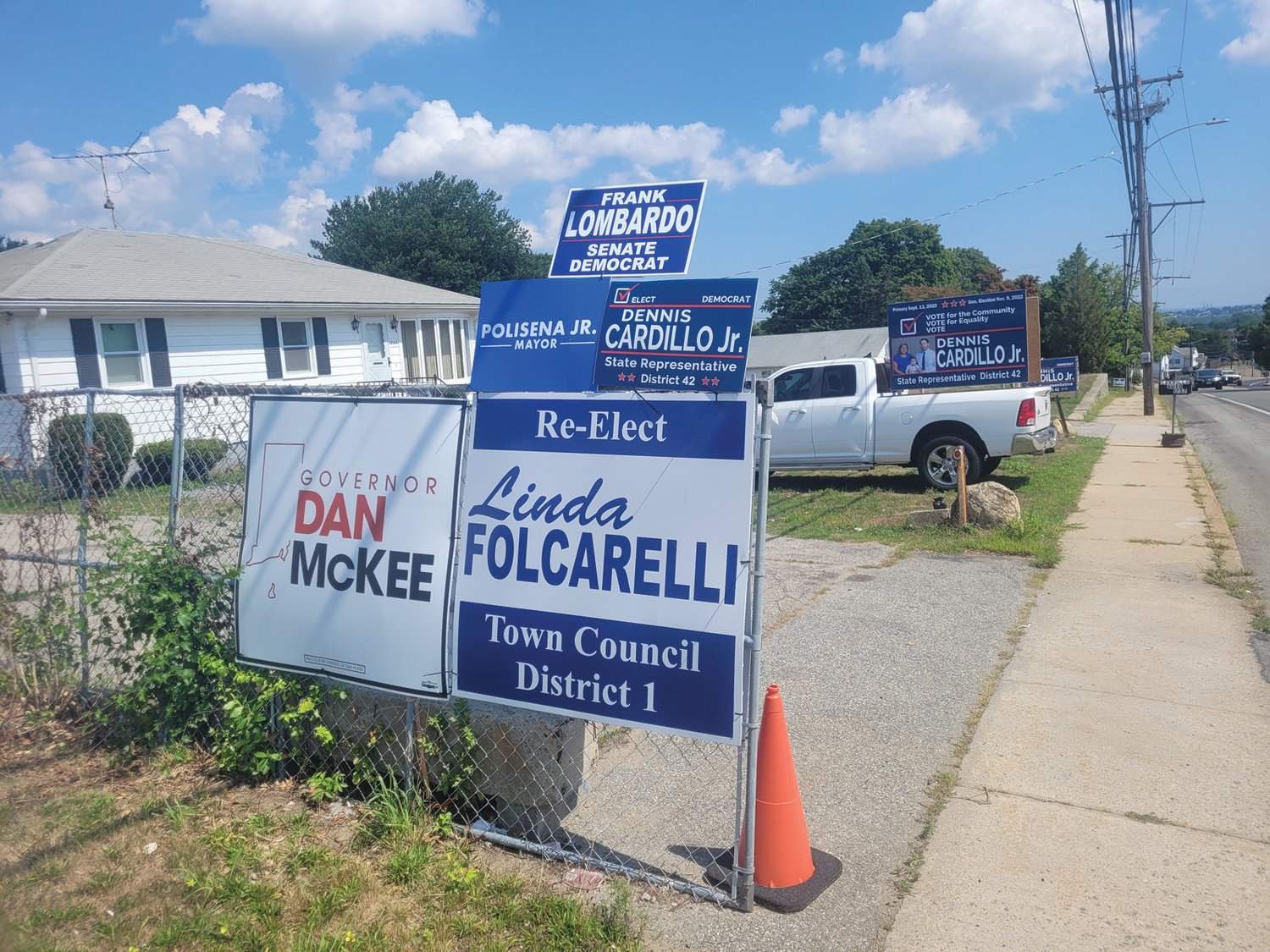 CAMPAIGN HQ? The incumbent state representative for District 42 (Cranston, Johnston), Rep. Ed Cardillo, alleges his nephew, Dennis Cardillo Jr., does not live at the address he provided on state election forms — 1757 Plainfield Pike. In fact, he alleges his nephew and opponent for the Democratic primary does not live within District 42. The home, which is also a commercial address, is occupied by the candidate’s father. The yard is packed with election signs.